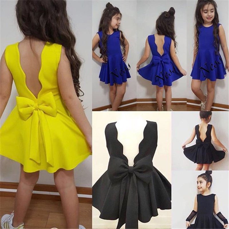 Dipped back and bow dress - Adorable Attire